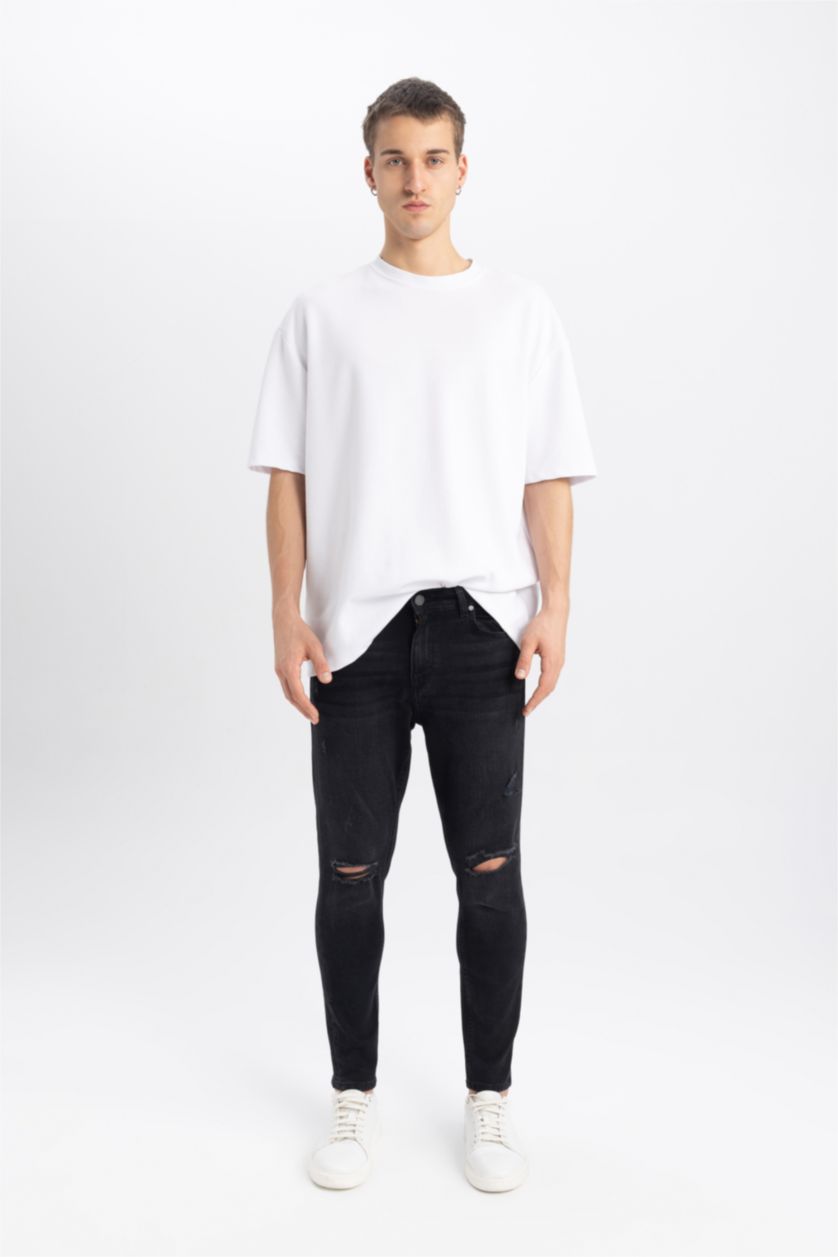 HOMME Noir Pantalon Jean Coupe Carotte avec Détails Déchirés