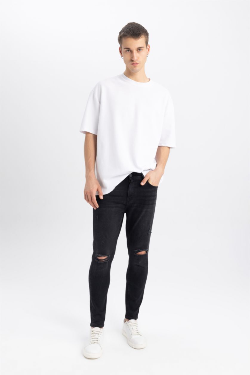 HOMME Noir Pantalon Jean Coupe Carotte avec Détails Déchirés