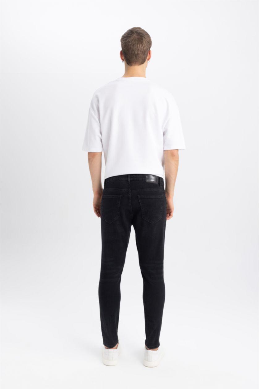HOMME Noir Pantalon Jean Coupe Carotte avec Détails Déchirés