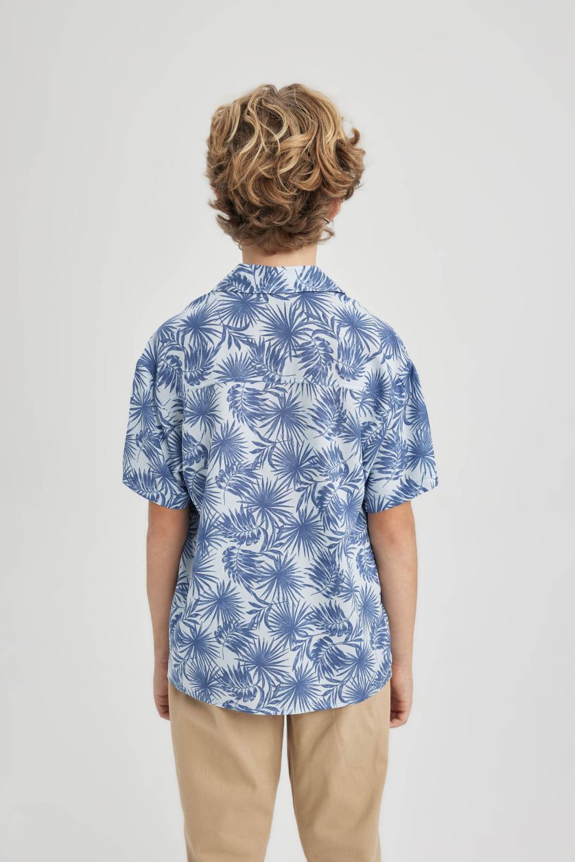 أولاد أزرق فاتح قميص بولو ولادي نص كم فيسكوز واسع