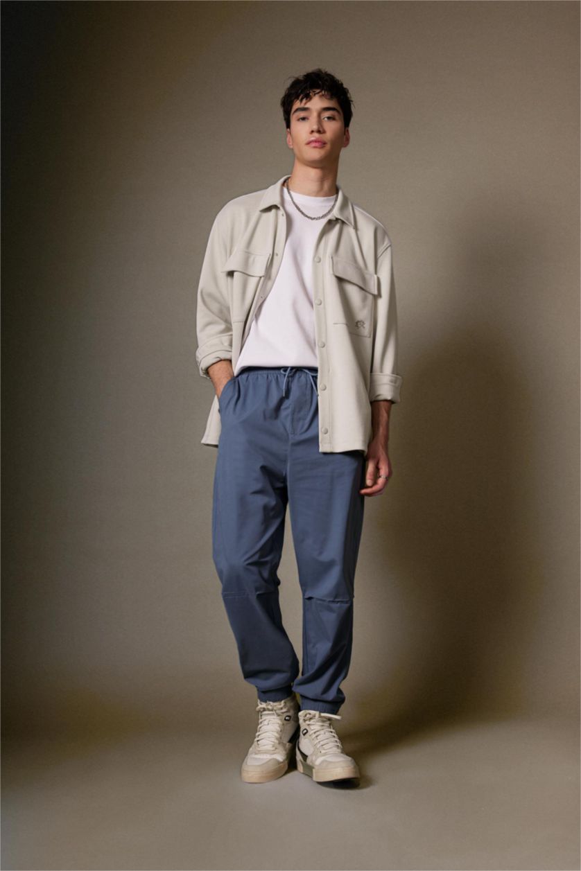 Erkek Açık İndigo Jogger Gabardin Pantolon Regular Beli Bağcıklı Cepli Lastikli Paça 