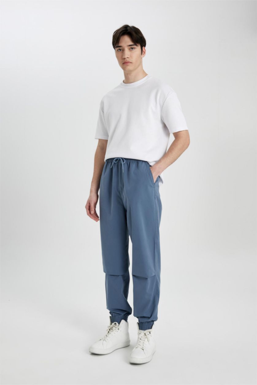 Erkek Açık İndigo Jogger Gabardin Pantolon Regular Beli Bağcıklı Cepli Lastikli Paça 