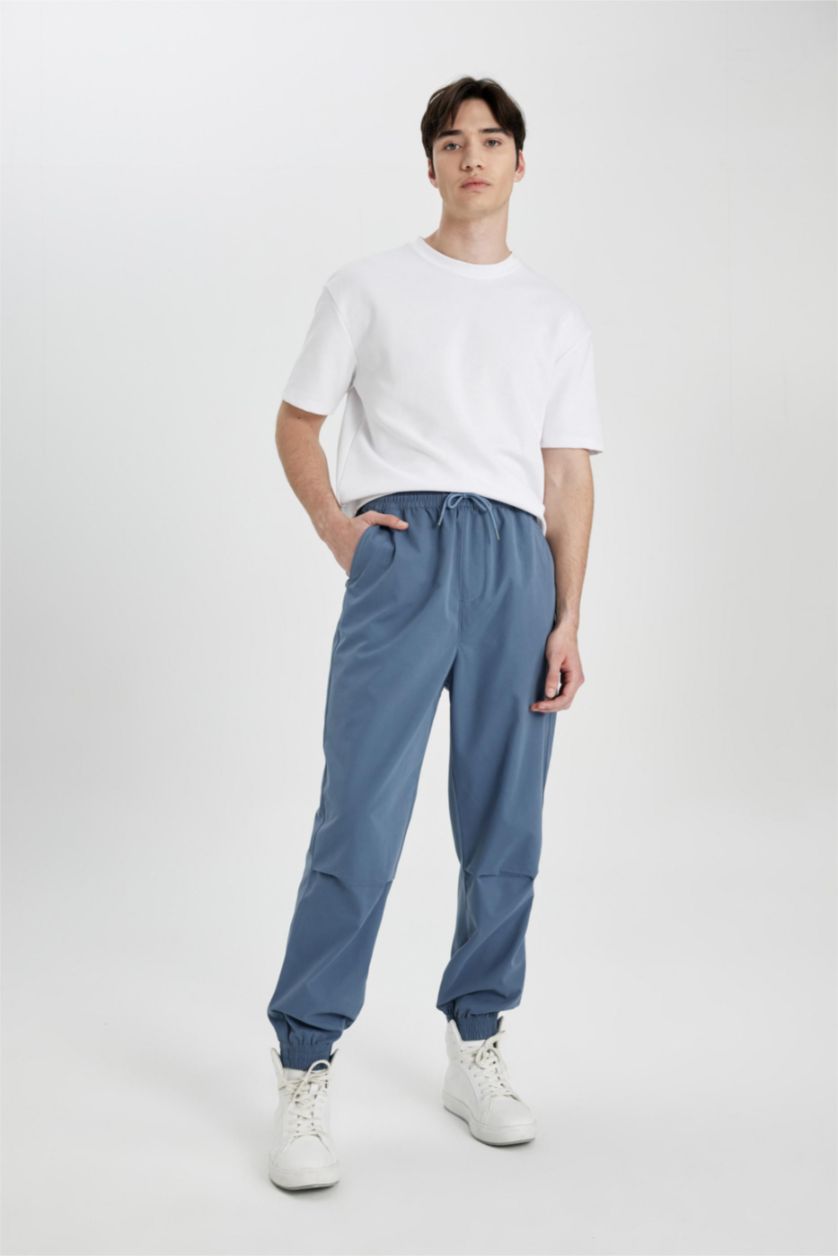 Erkek Açık İndigo Jogger Gabardin Pantolon Regular Beli Bağcıklı Cepli Lastikli Paça 
