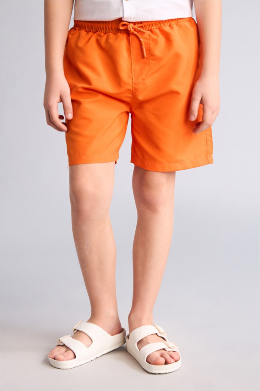 أولاد برتقالي شورت بحر بيزك