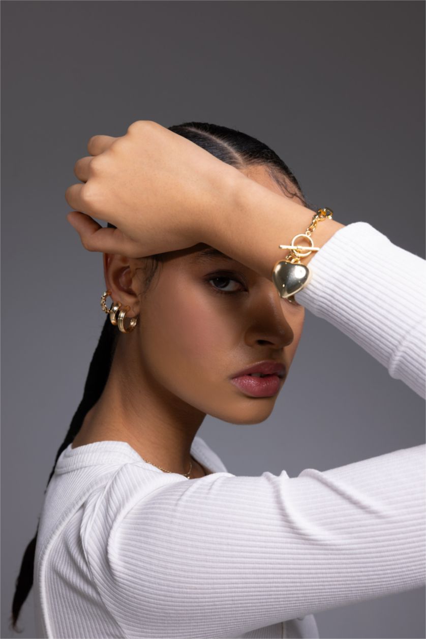 WOMAN GOLD أسورة