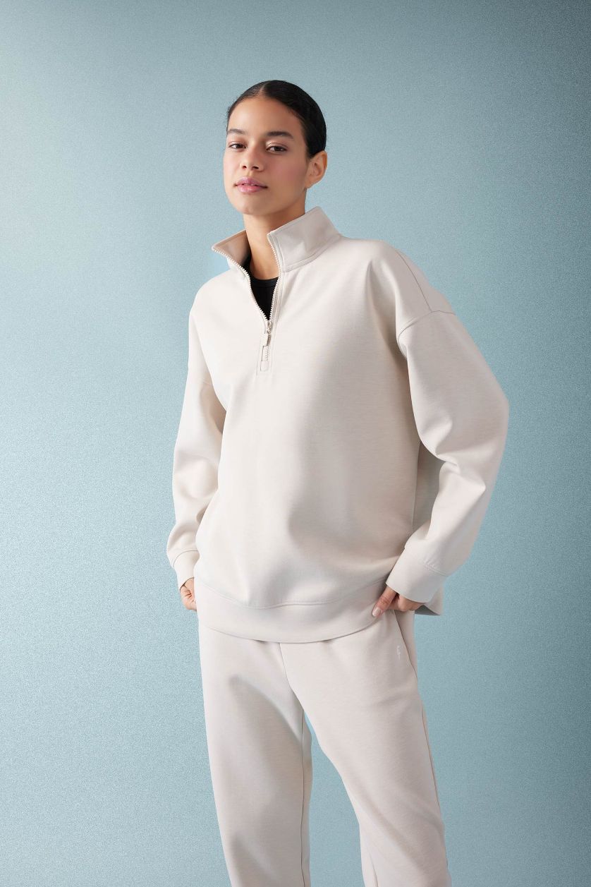نساء اللون الرملي سويت شيرت رياضي اوفر سايز بياخة عالية بنصف سحاب من DeFactoFit