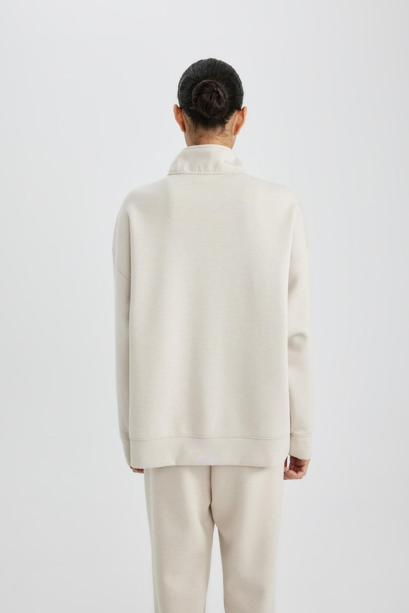 نساء اللون الرملي سويت شيرت رياضي اوفر سايز بياخة عالية بنصف سحاب من DeFactoFit