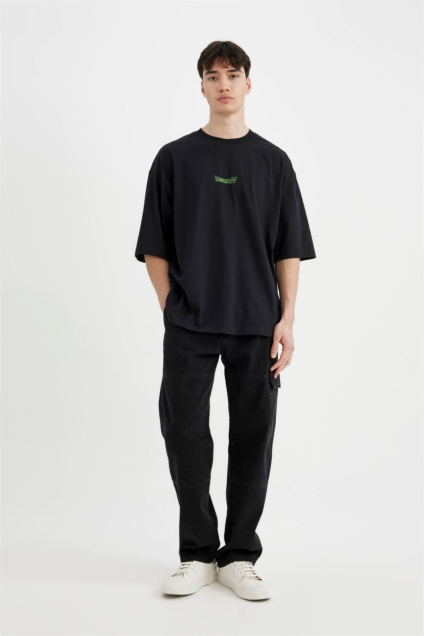 رجال أسود تيشيرت جيرسي مطبوع قصة فضفاضة بياخة مستديرة