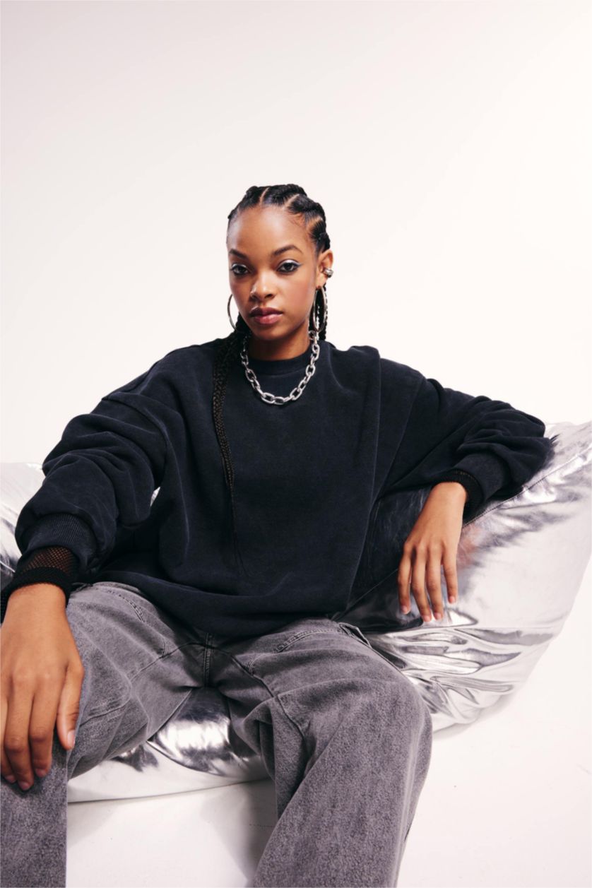 حريمي أسود سويت شيرت اوفر سايز برقبة مستديرة