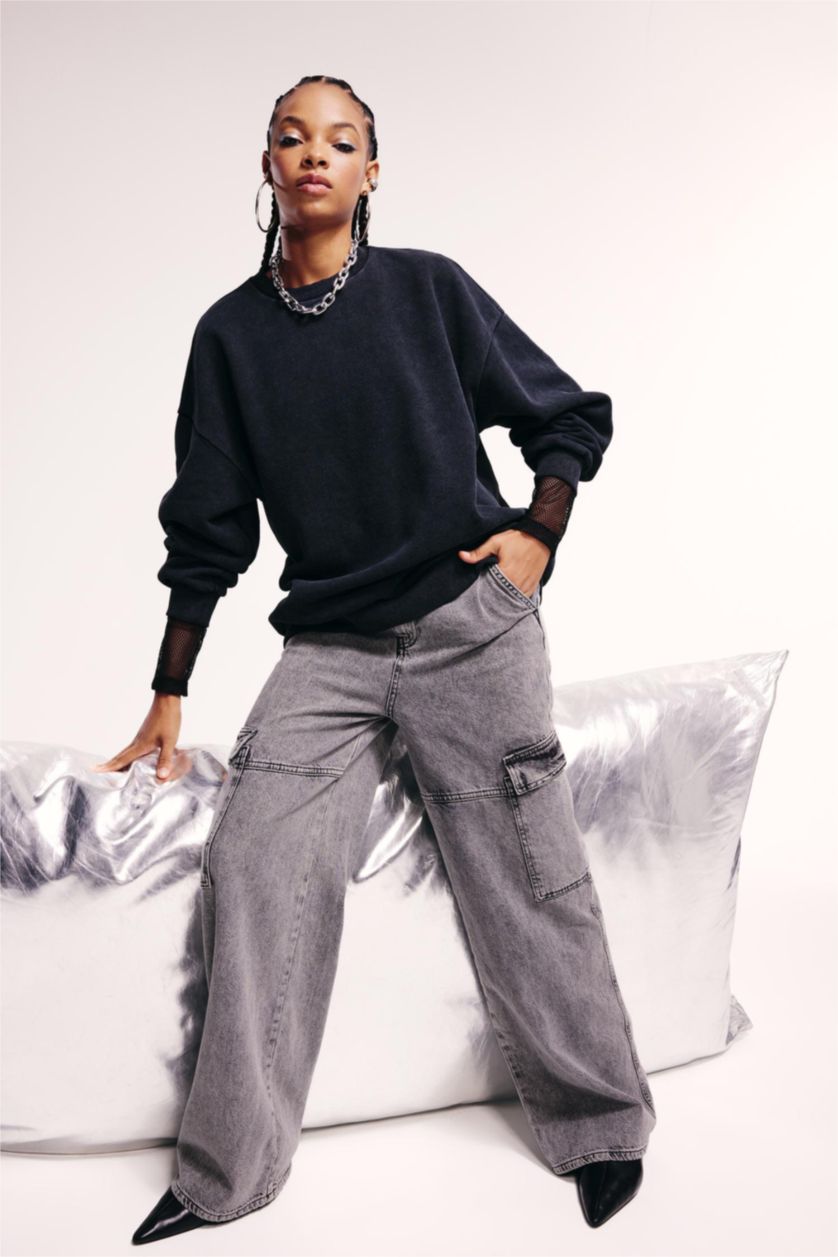 حريمي أسود سويت شيرت اوفر سايز برقبة مستديرة