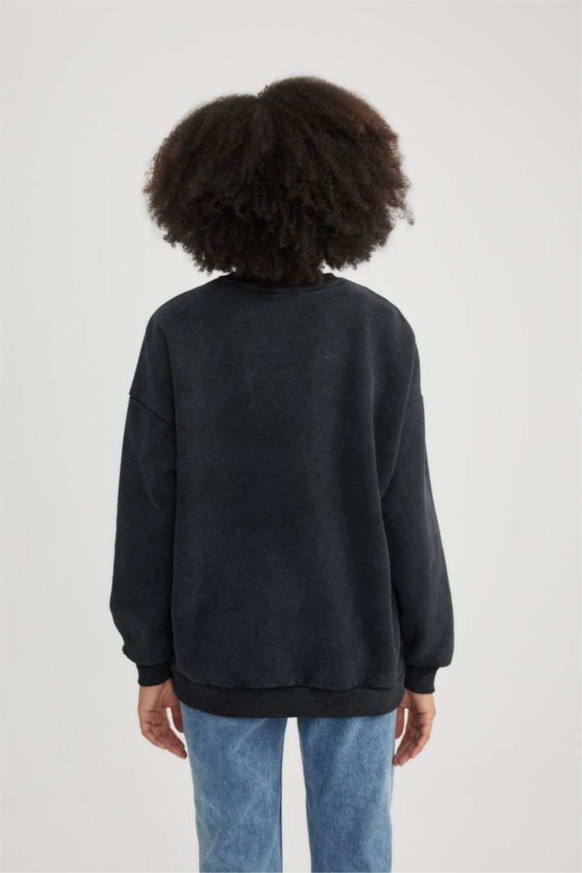 حريمي أسود سويت شيرت اوفر سايز برقبة مستديرة