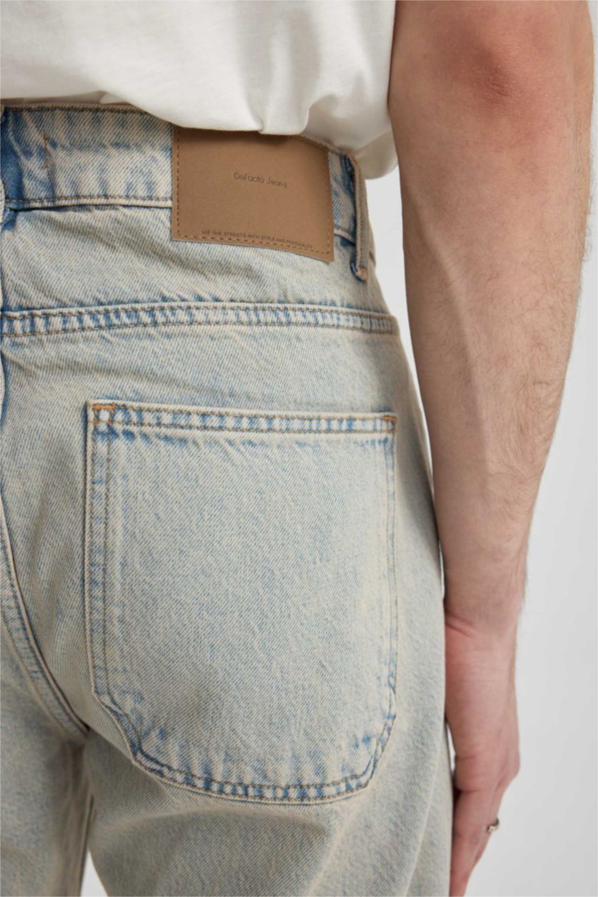 Erkek Açık Mavi Flare Fit Bol Kalıp Normal Bel Geniş Paça Soluk Efektli Jean Pantolon