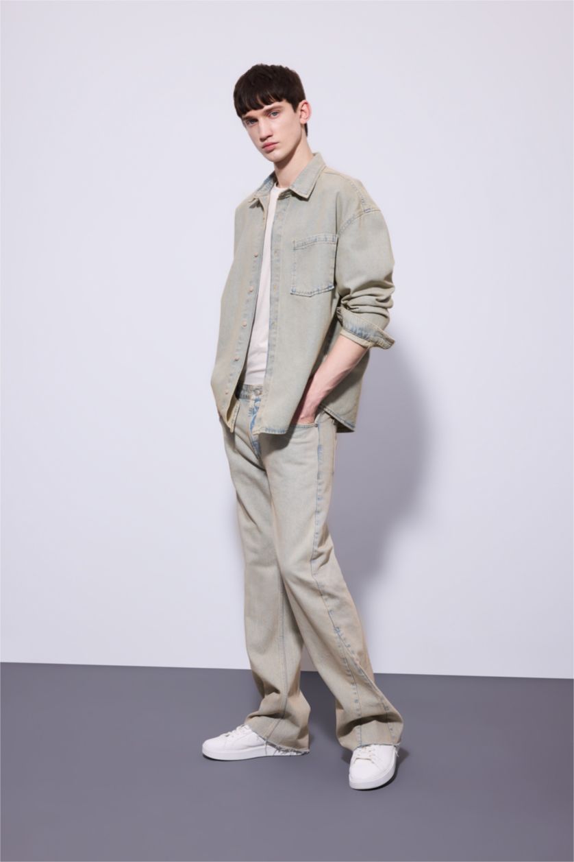 Erkek Açık Mavi Flare Fit Bol Kalıp Normal Bel Geniş Paça Soluk Efektli Jean Pantolon