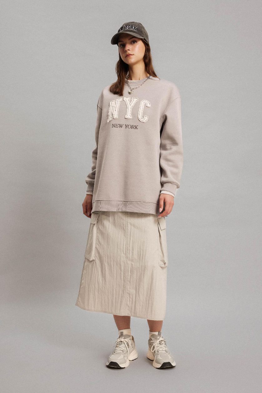 حريمي رمادي فاتح جيبة طويلة باراشوت بقصة A