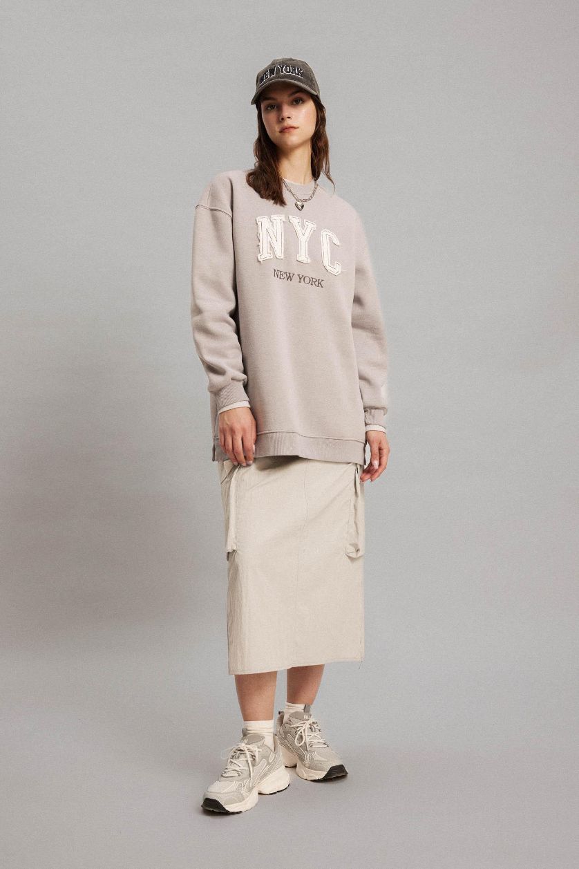 حريمي رمادي فاتح جيبة طويلة باراشوت بقصة A