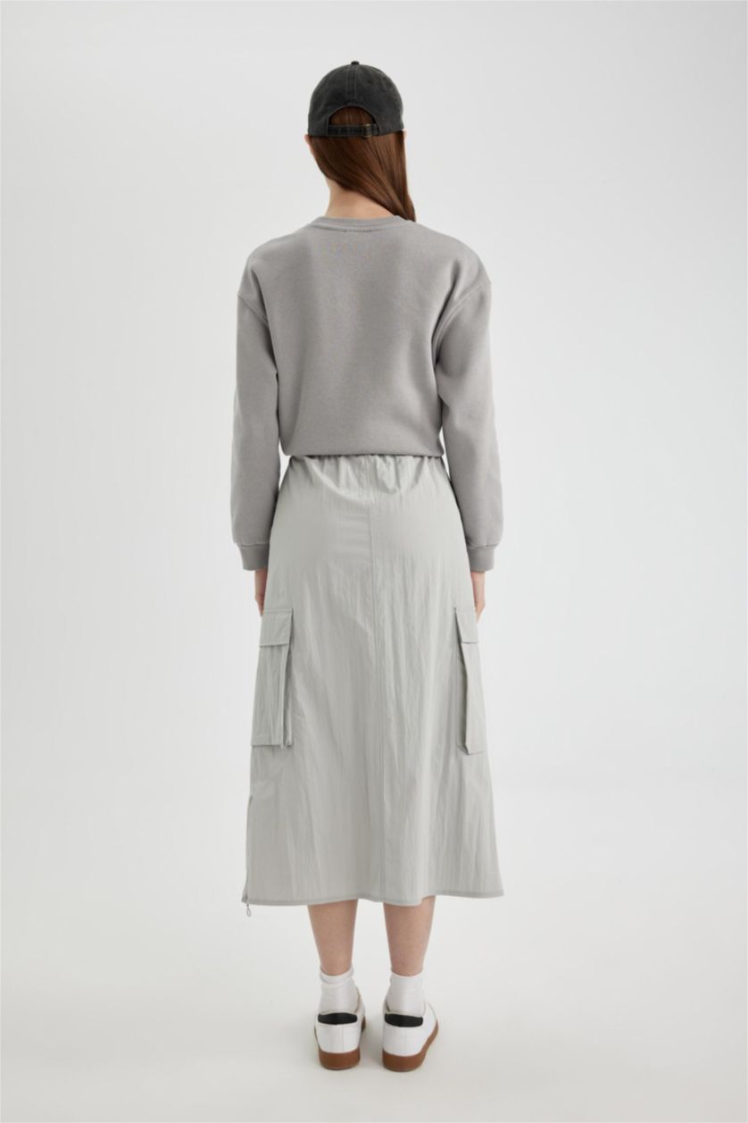 حريمي رمادي فاتح جيبة طويلة باراشوت بقصة A