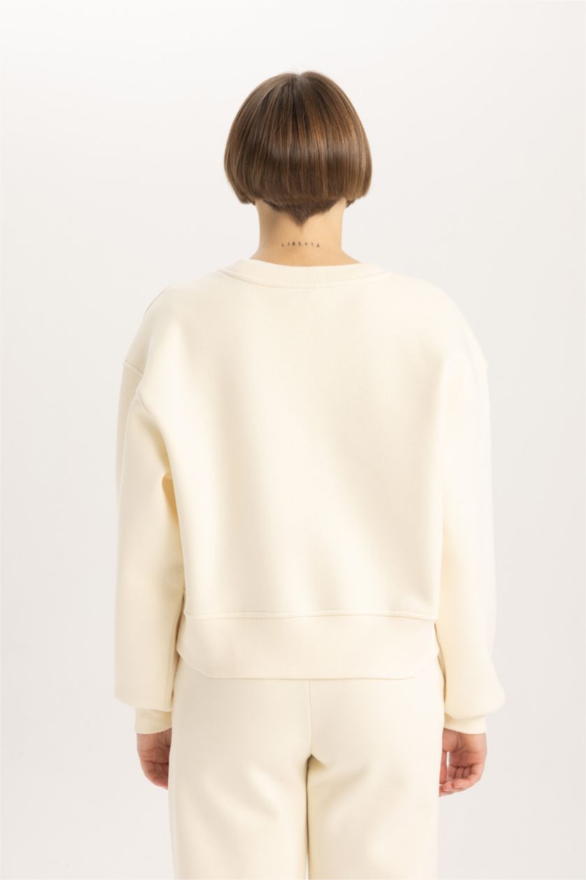 حريمي اللون الرملي سويت شيرت بيزك تقيل بطبعة شعار قصة مريحة