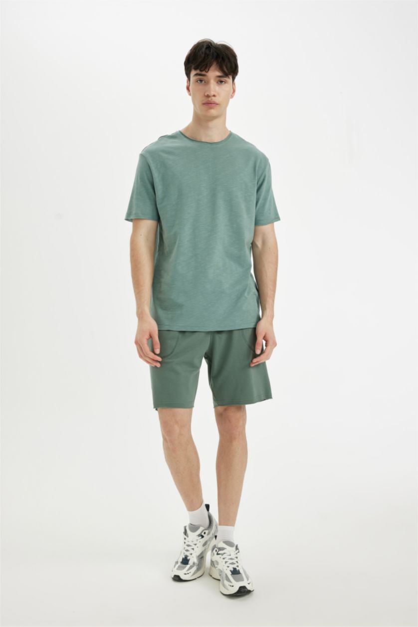 HOMME Vert Short Coupe slim raccourcie