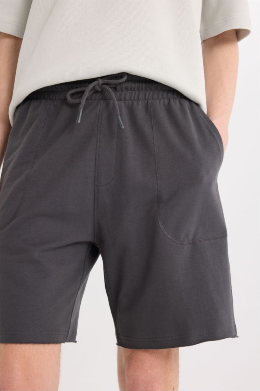 رجال أنثرا شورت سليم فيت عادي من قطن