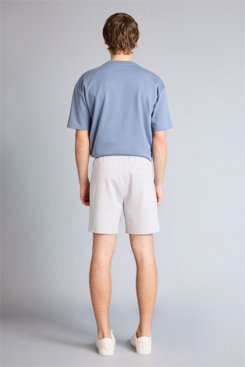 رجال اللون الحجري شورت كابري سليم فيت بساق ضيق