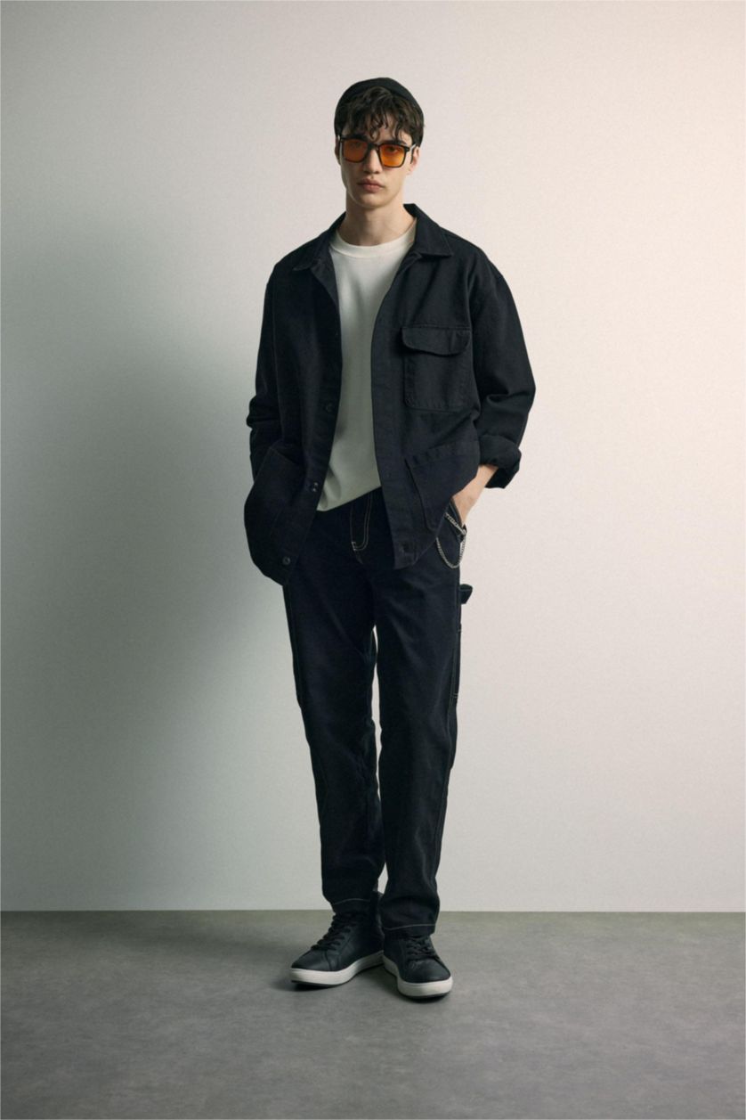 MAN Black Wide Leg Fit Normal Waist Trousers