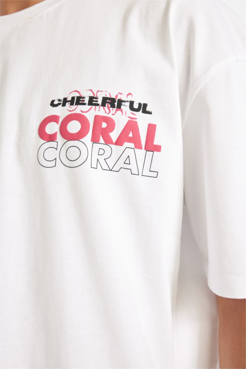 Erkek Beyaz %100 Pamuk Oversize Geniş Kalıp Bisiklet Yaka Sırt Baskılı Kısa Kollu Tişört