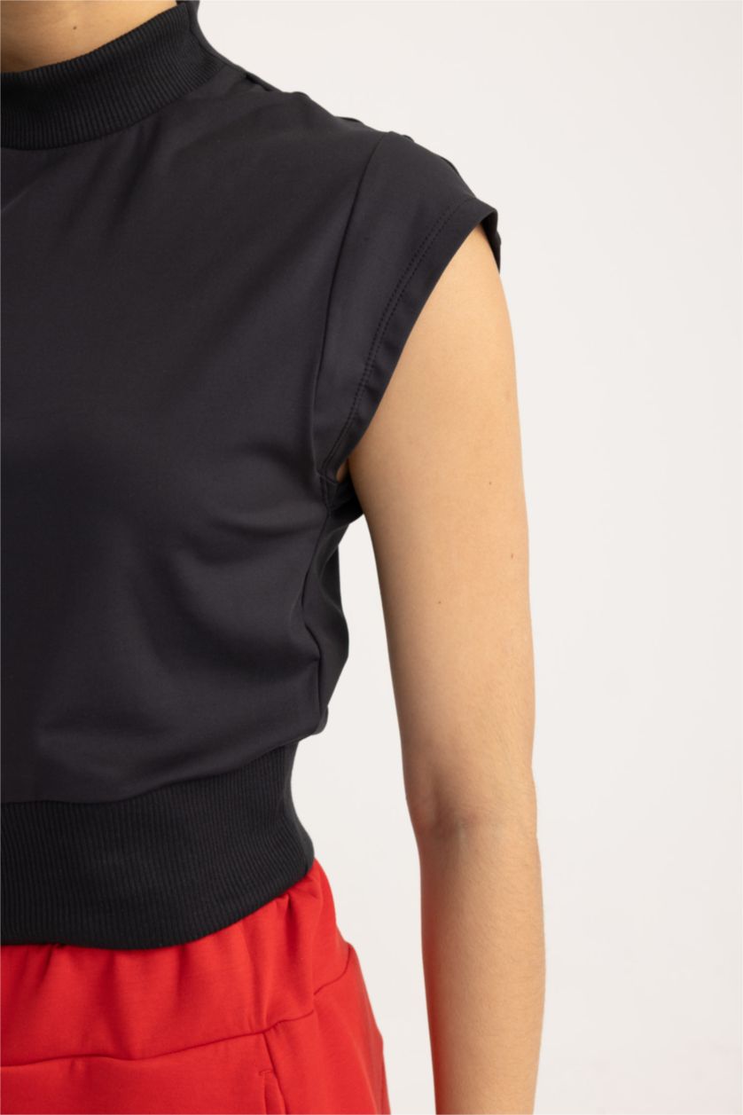 FEMME Noir T-shirt de sport à manches courtes avec col montant