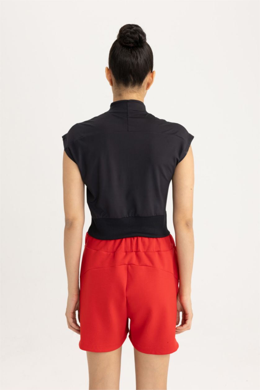 FEMME Noir T-shirt de sport à manches courtes avec col montant