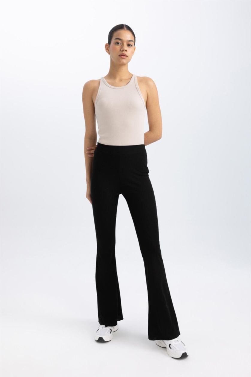 Woman Black DeFactoFit Flare Fit Standard Length Ribbed Trousers