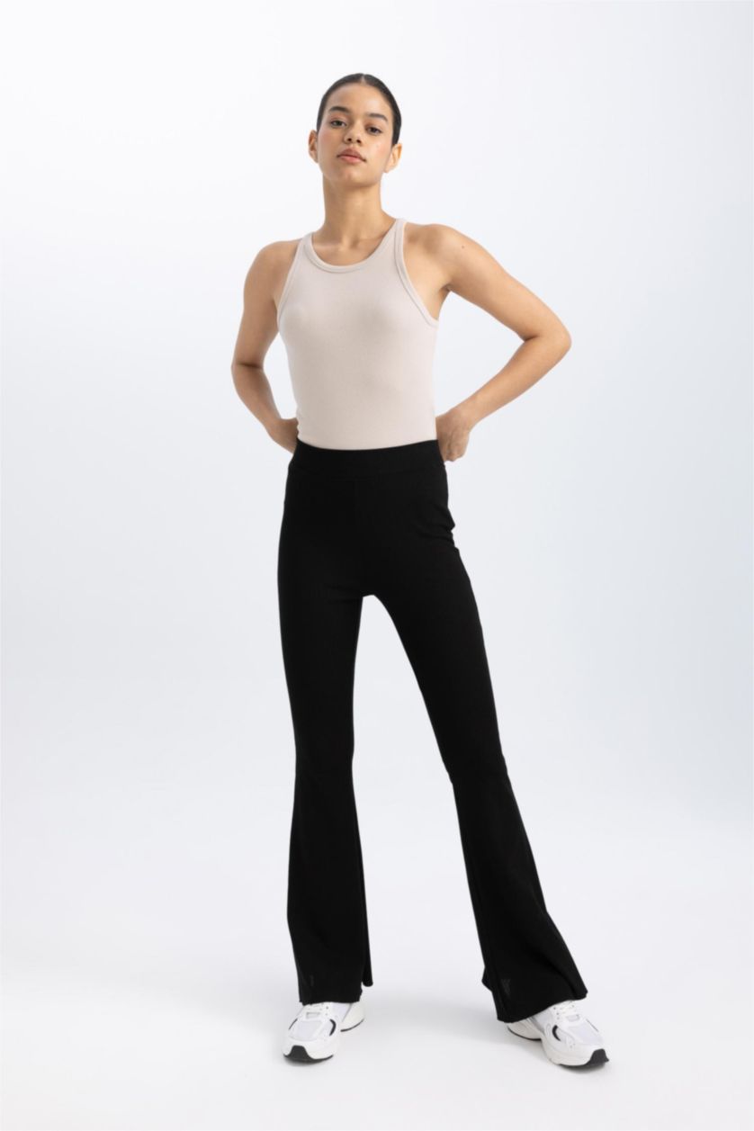 Woman Black DeFactoFit Flare Fit Standard Length Ribbed Trousers