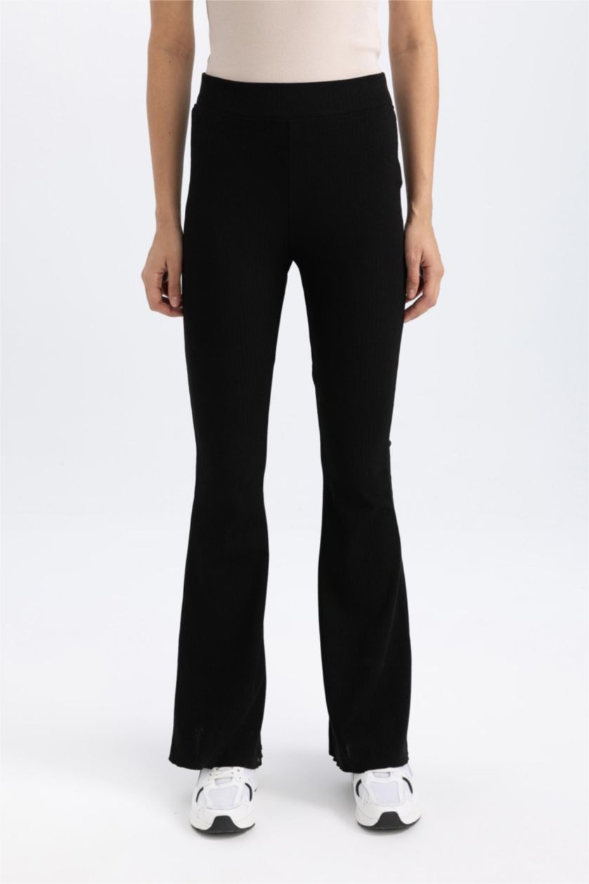 Woman Black DeFactoFit Flare Fit Standard Length Ribbed Trousers
