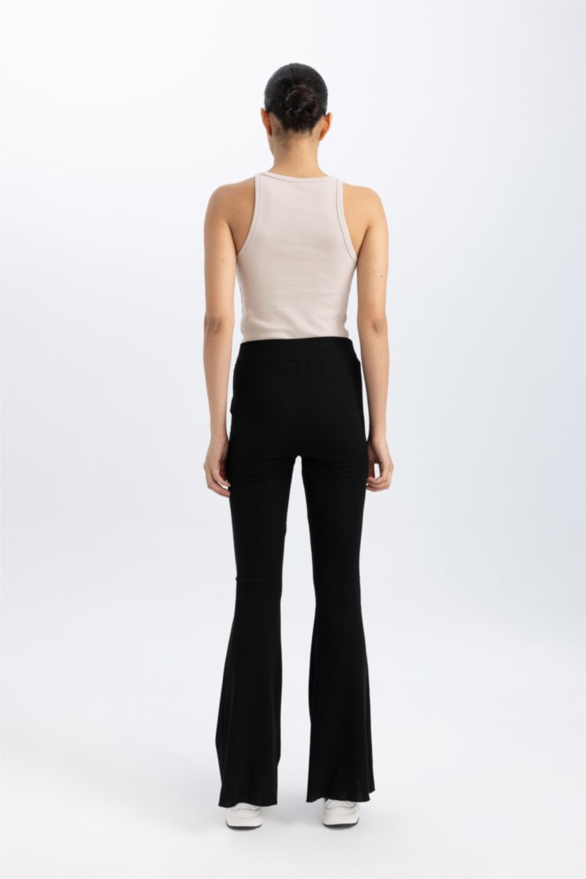 Woman Black DeFactoFit Flare Fit Standard Length Ribbed Trousers