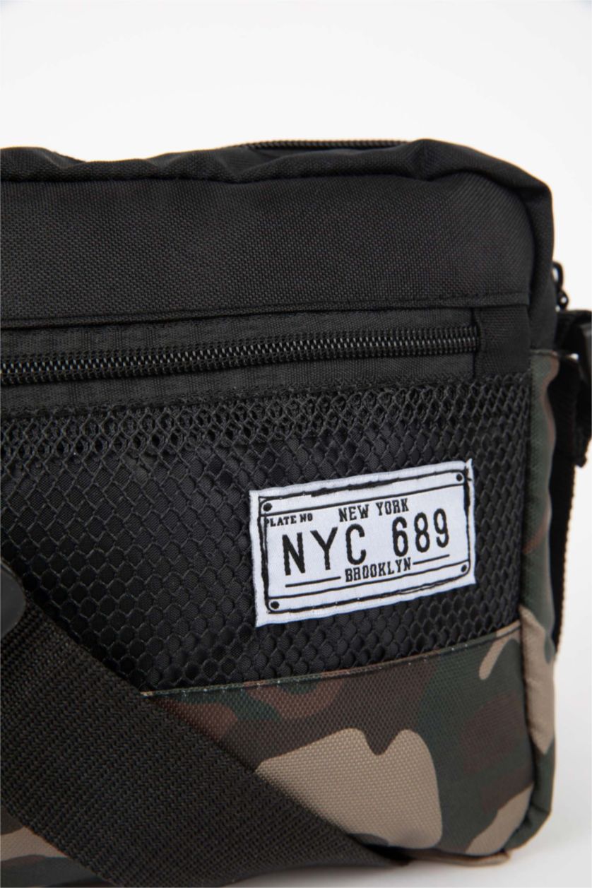 HOMME Karma Sac à bandoulière
