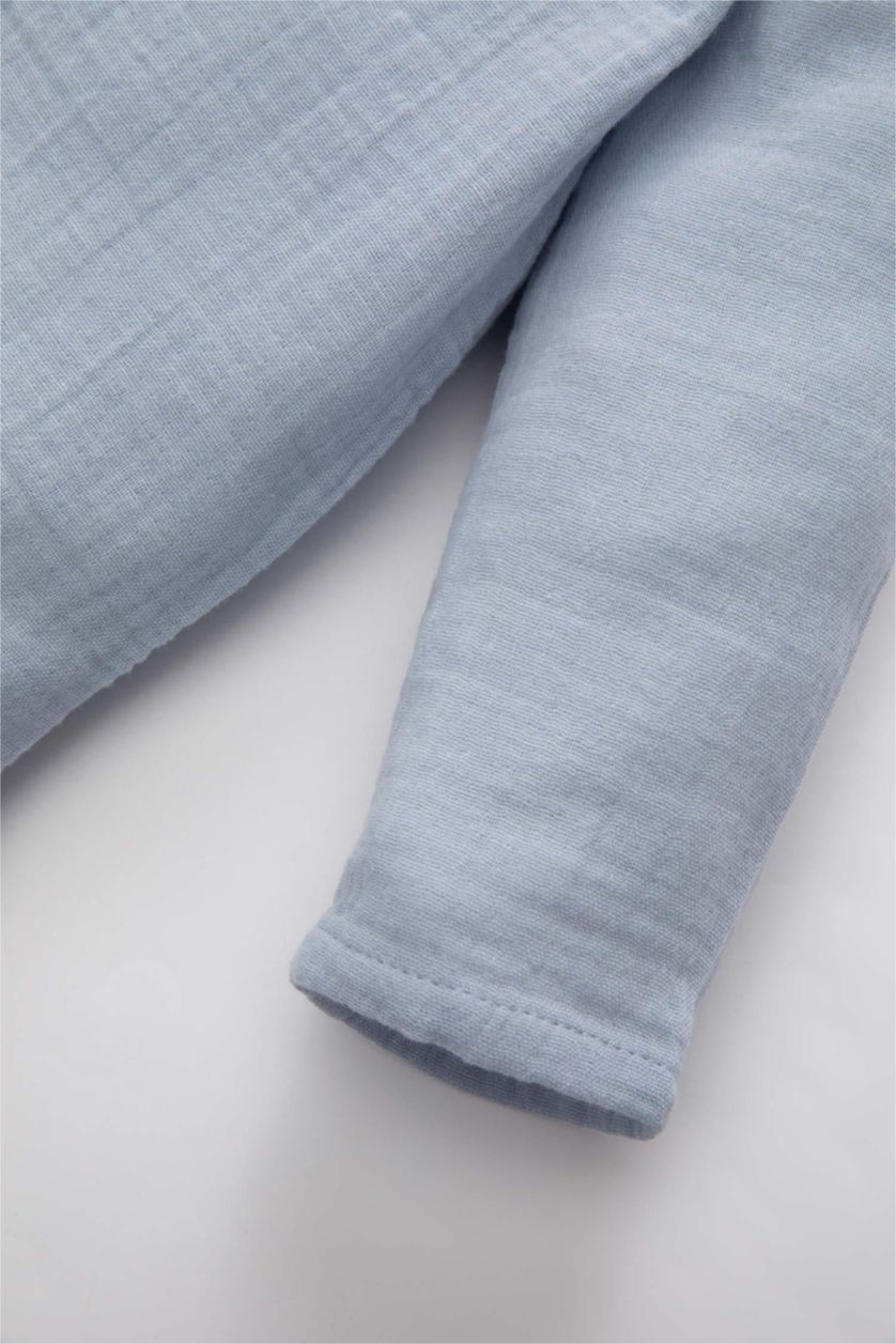 مولود ذكر أزرق فاتح طقم ولادي قميص وسروال موسلين - قطعتين