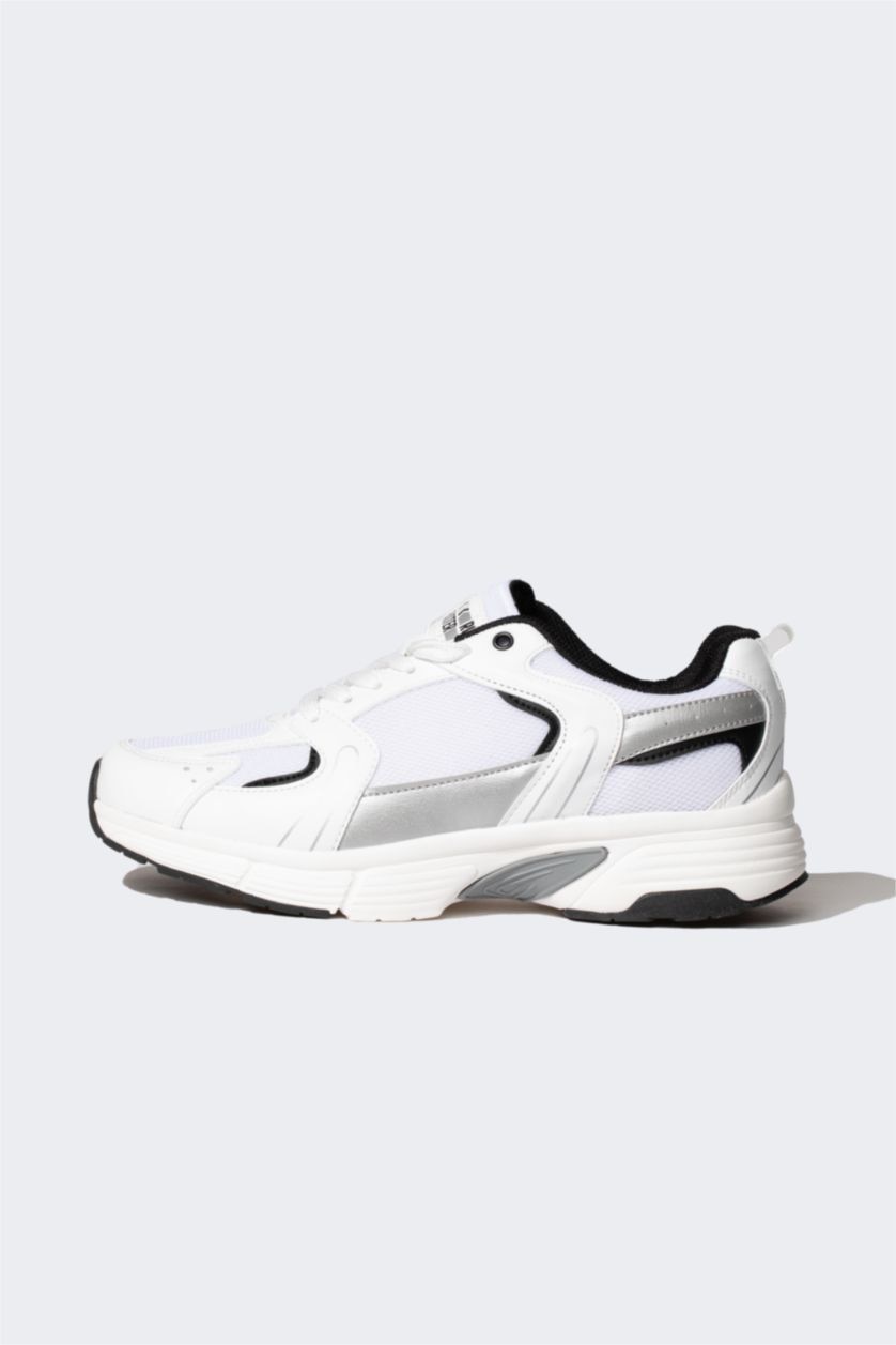 حريمي أبيض (000) حذاء رياضي حريمي جلد صناعي برباط