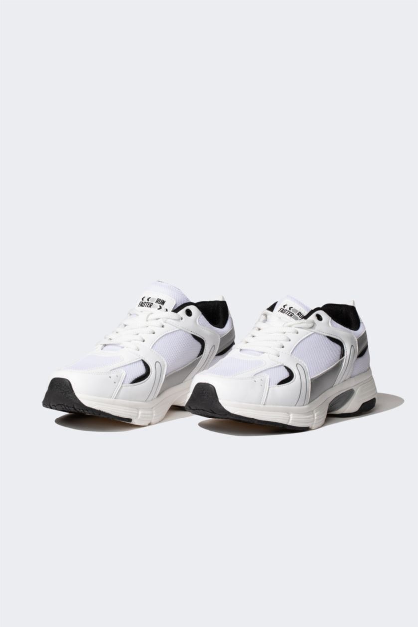 حريمي أبيض (000) حذاء رياضي حريمي جلد صناعي برباط