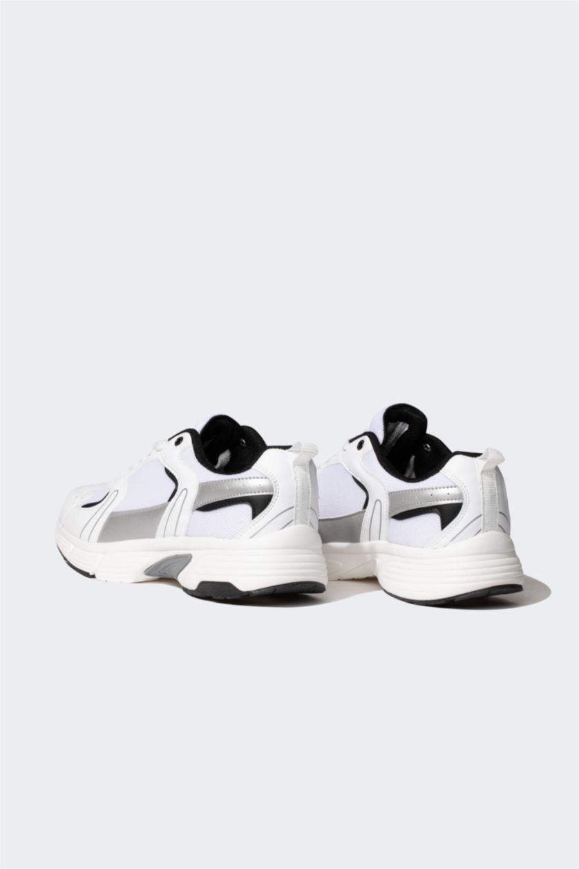 حريمي أبيض (000) حذاء رياضي حريمي جلد صناعي برباط