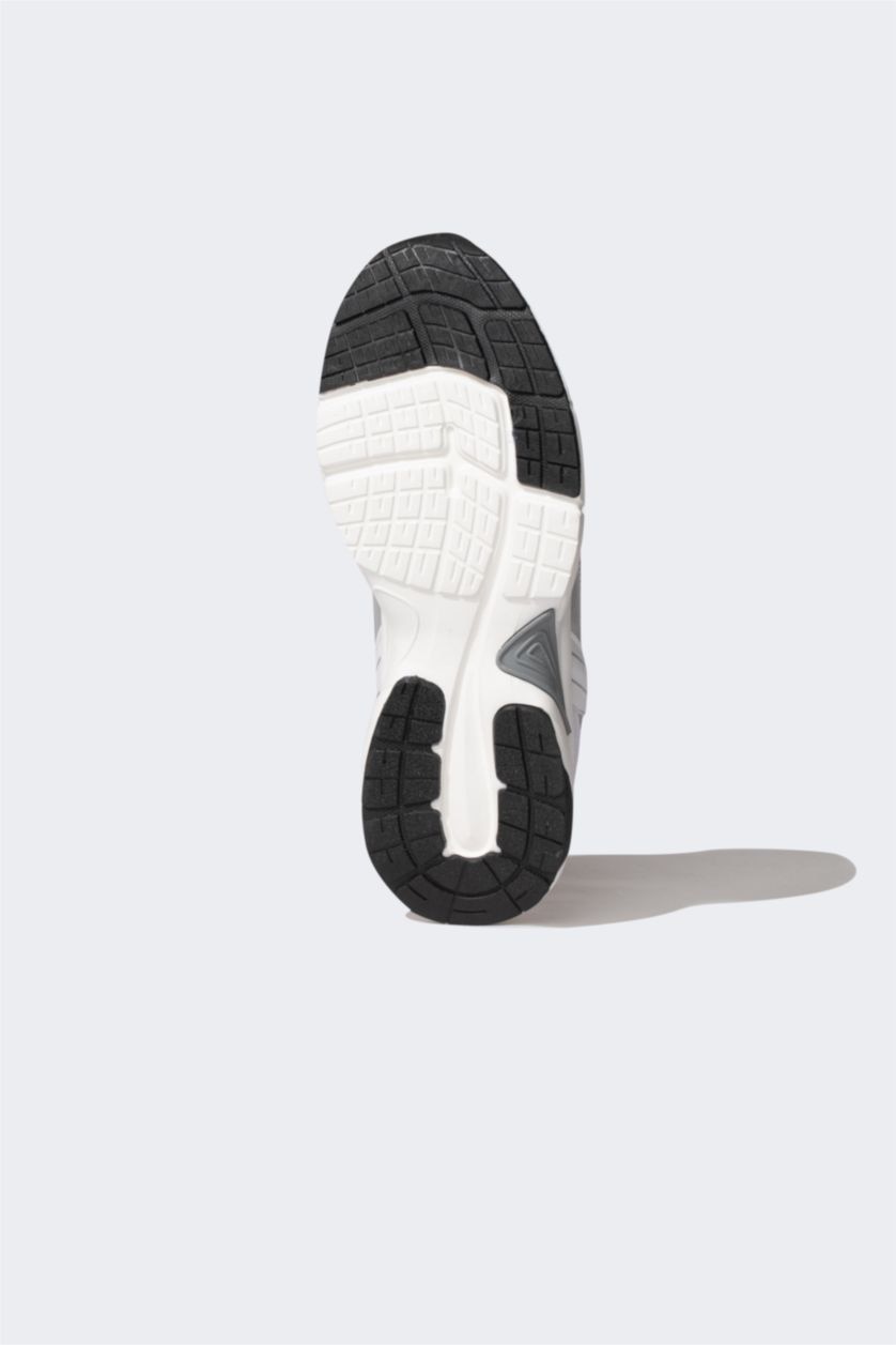 حريمي أبيض (000) حذاء رياضي حريمي جلد صناعي برباط