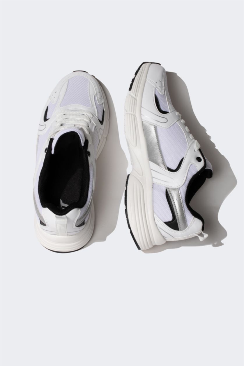 حريمي أبيض (000) حذاء رياضي حريمي جلد صناعي برباط