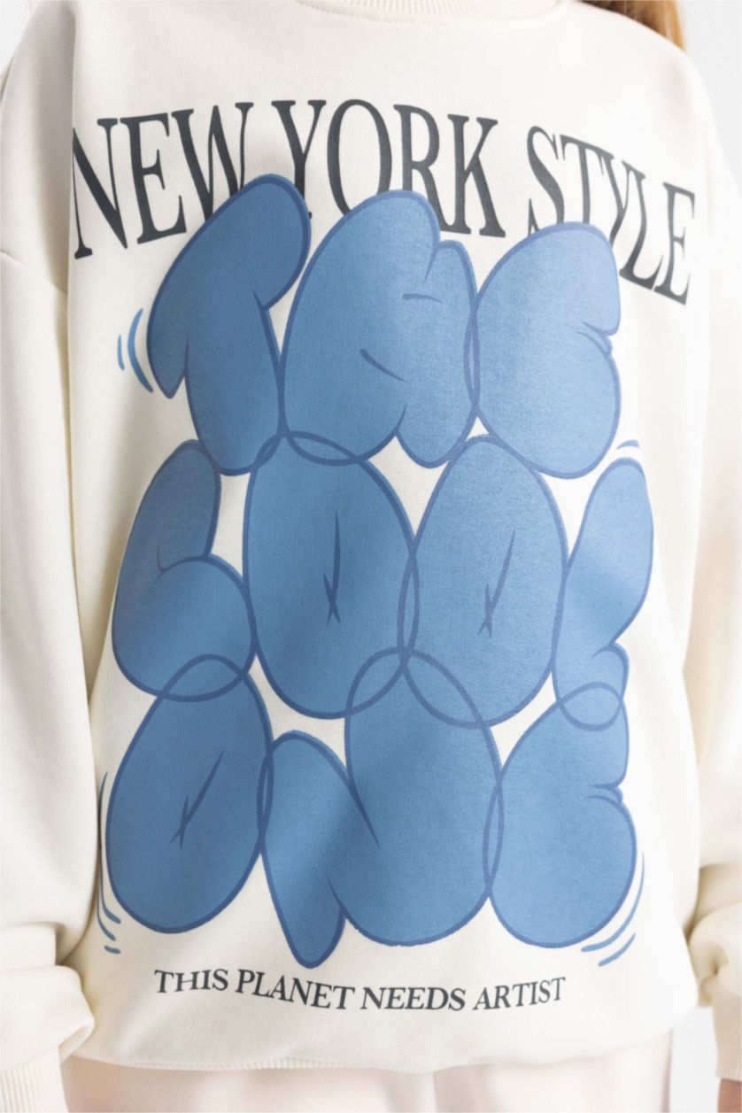 بنات بيج فاتح سويت شيرت بناتي اوفر سايز بياقة مستديرة