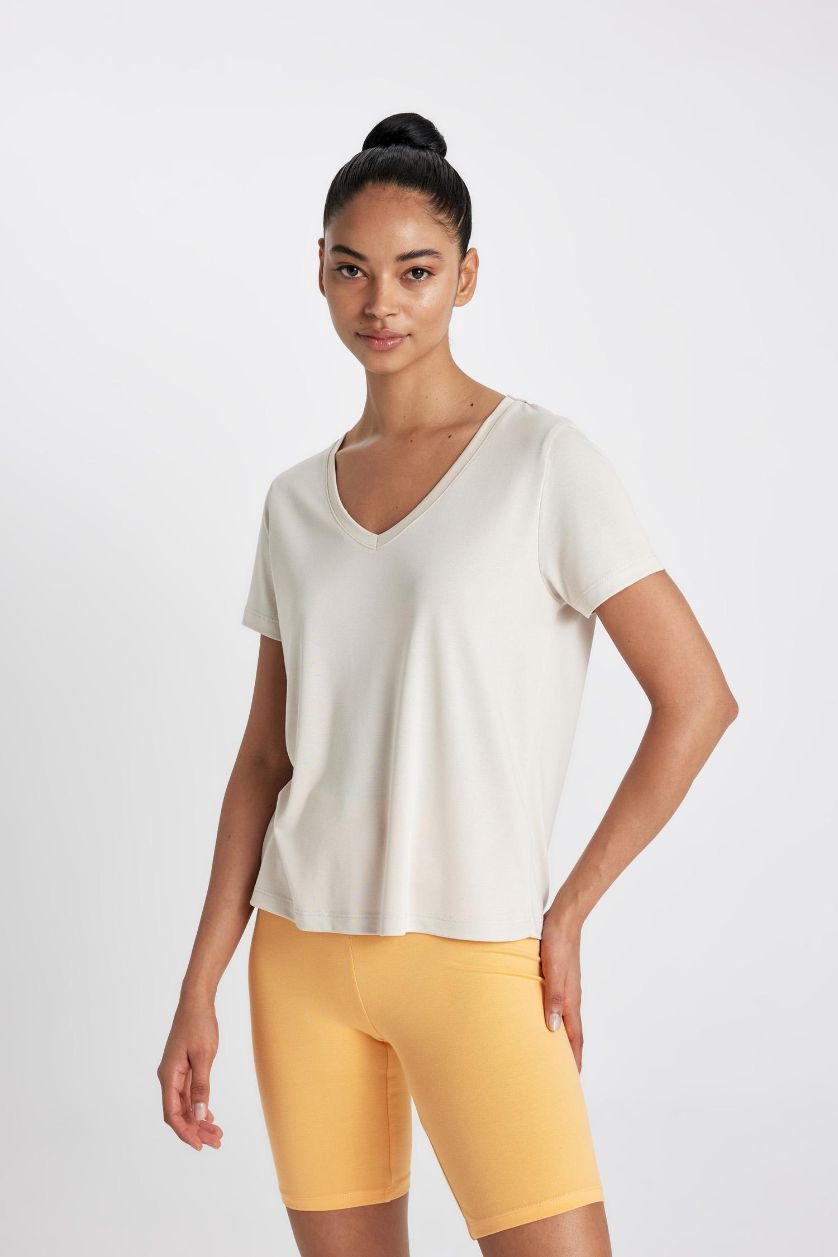 حريمي بيج فاتح تيشيرت نص كم قصة عادية نسيج مشروط بياقة V من DeFactoFit