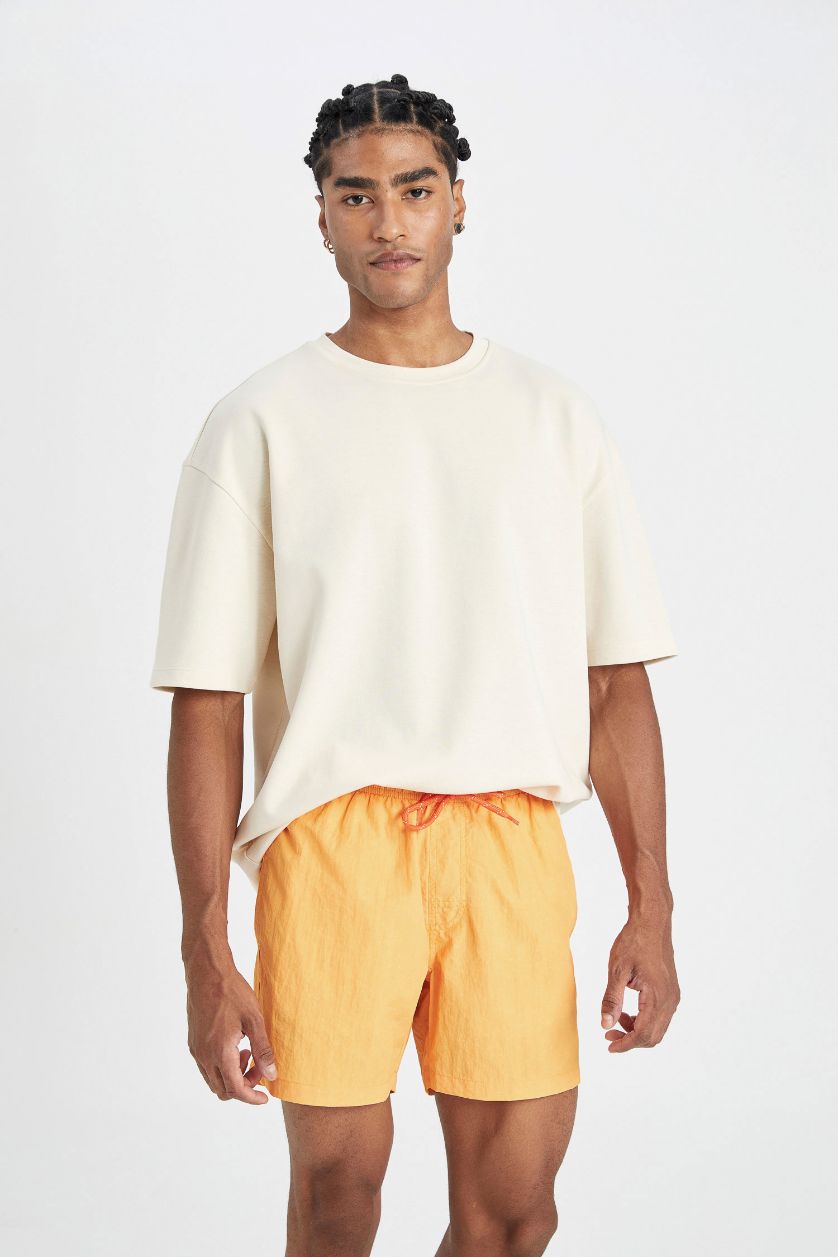 رجال برتقالي فاتح شورت بحر قصير ببطانة شبكية
