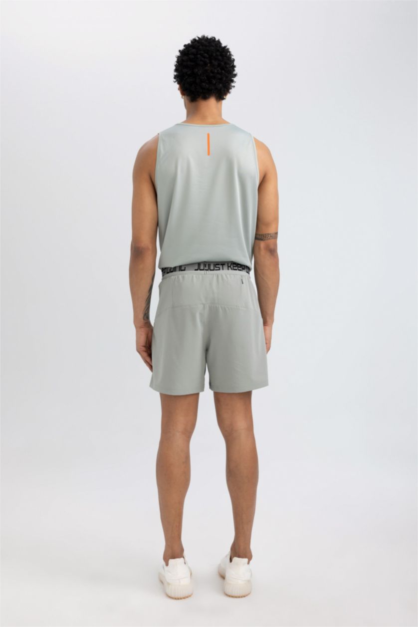 رجالي أخضر شورت رياضي سليم فيت برباط من DeFactoFit