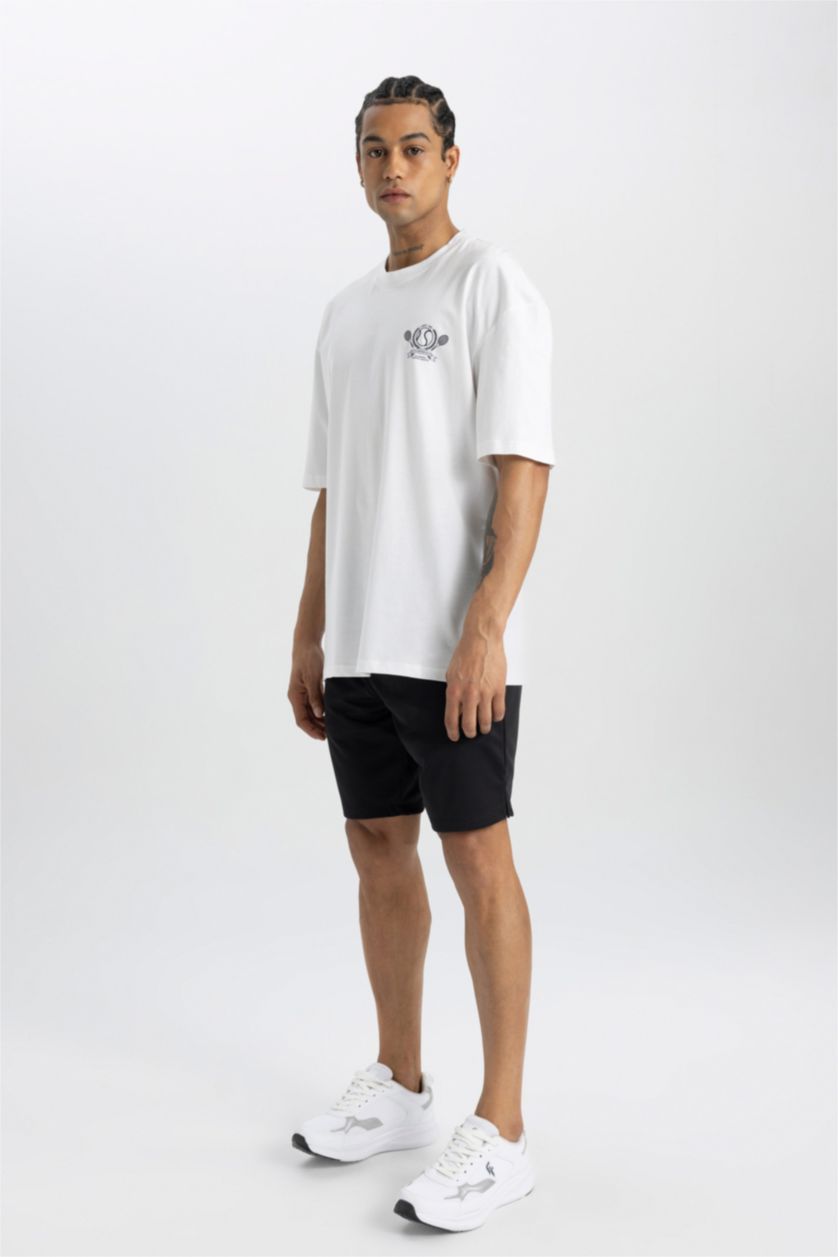 رجال أبيض تي شيرت مطبوع اوفر سايز بياقة مستديرة بطبعة من الخلف من DeFactoFit