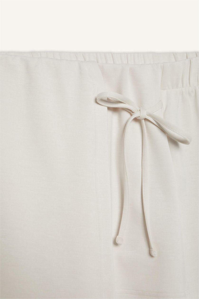 نساء بيج فاتح DeFactoFit شورت رياضي قضير قصة عادية من
