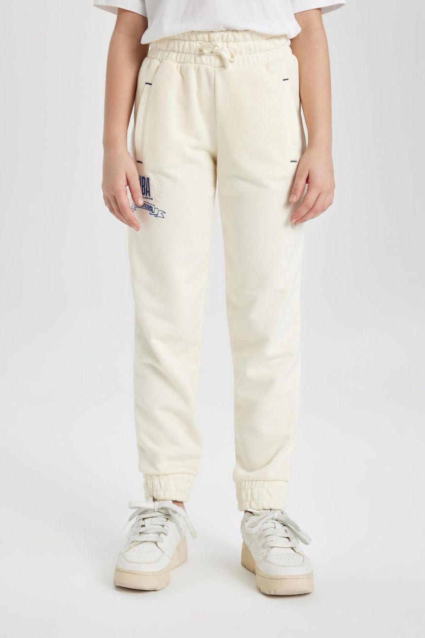 Kız Çocuk - Genç Kız Ekru Kız Çocuk NBA Wordmark Beli ve Paçası Lastikli Cepli Jogger Eşofman Altı