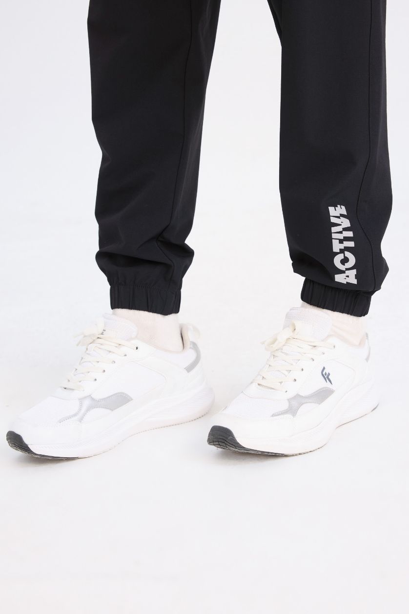 Erkek Siyah Dokuma Esnek Multifonksiyonel Sporcu Jogger Eşofman Altı Slim Fit Dar Kesim Çift Cepli