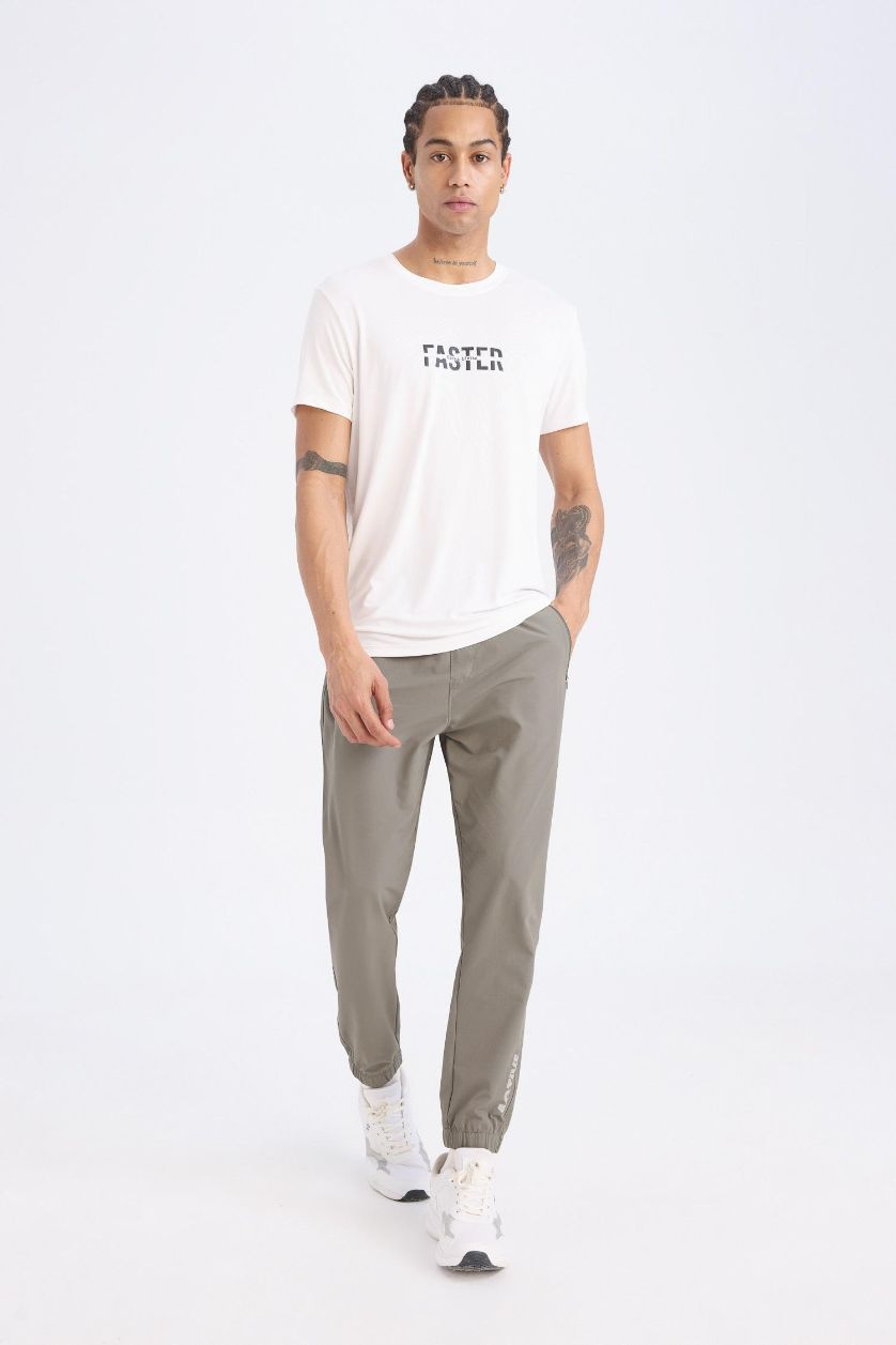 رجال كاكي بنطلون بجامة رياضي منسوج سليم فيت من DeFactoFit