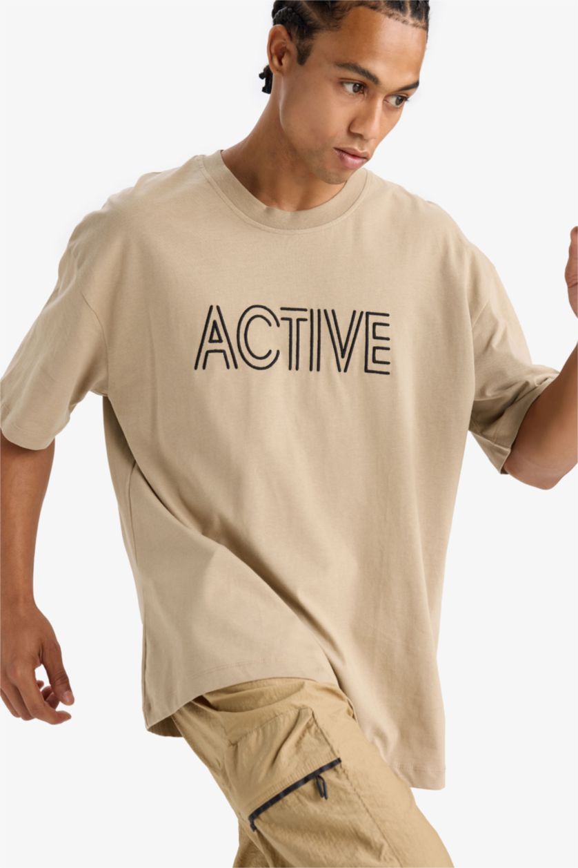 رجالي فيزوني تي شيرت اوفر سايز مطرز برقبة مستديرة من DeFactoFit