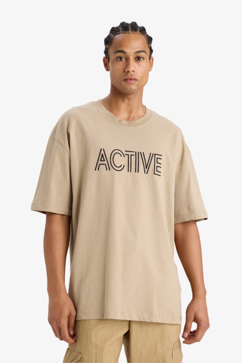 رجالي فيزوني تي شيرت اوفر سايز مطرز برقبة مستديرة من DeFactoFit